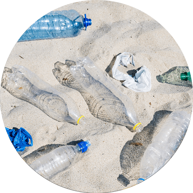 Pure Water Systems of Chicagoland environmentally friendly empty bottles in sand